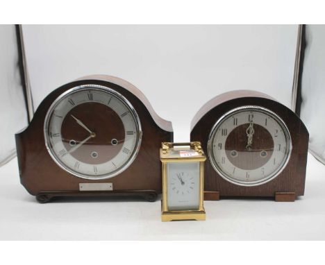 A Mappin &amp; Webb lacquered brass cased carriage clock together with a oak cased mantel clock and one other walnut cased ex