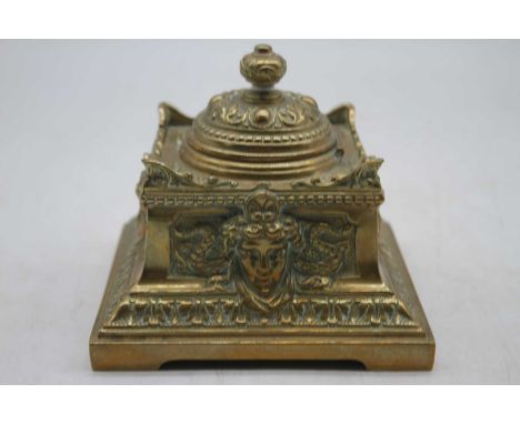 A Victorian brass inkwell, height 9cm