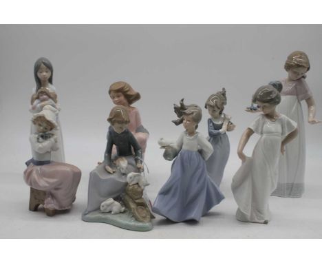 A collection of eight various Nao Spanish porcelain figures, height of largest 25cm