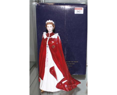 A Royal Worcester figure in celebration of The Queen's 80th birthday, dressed in the robes of the Order of the British Empire
