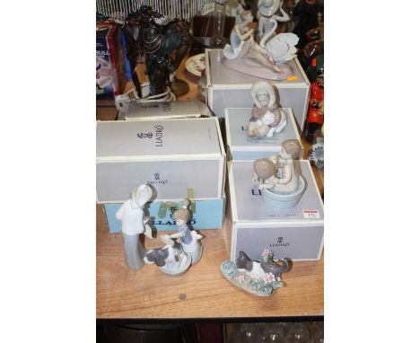A collection of six Lladro figures to include Bashful Bather, Eskimo Playing, Grace &amp; Beauty, and Bathtime, etc, boxed (6