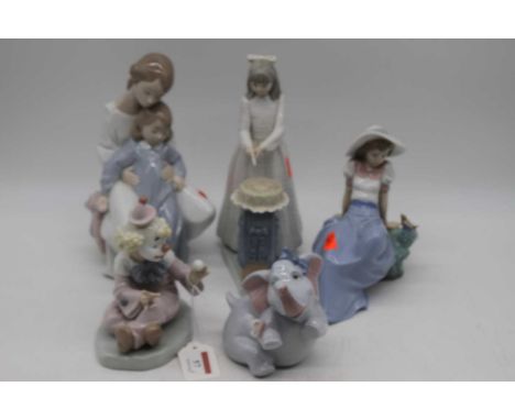 A collection of five Nao Spanish porcelain figures to include Clown, etc