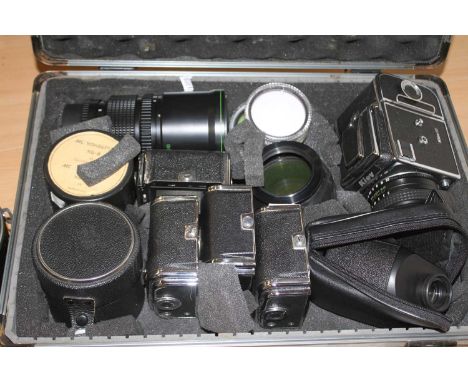 A Kiev 88 medium format camera; together with various accessories to include lenses, in camera case