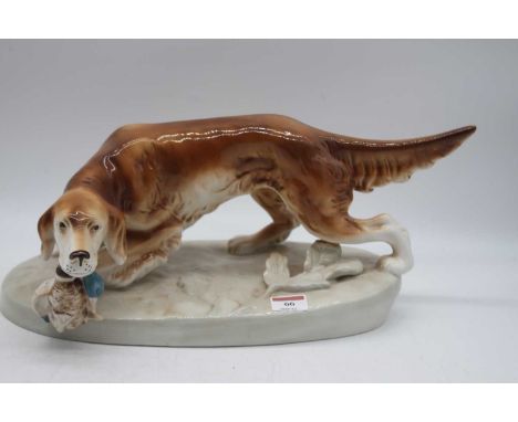 A large Royal Dux figure of a gun dog and duck having raised pink triangle mark verso, width 41cm