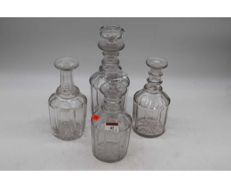 A Regency style triple ring neck decanter with stopper, together with three others (2 lacking stoppers) (4)