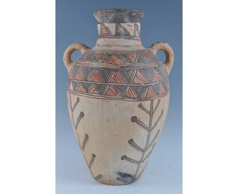 A large pottery twin handled vase of amphora shape, with traditional brushed painted bi-chrome decoration, Bedouin People, Mo