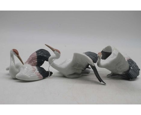 Three Lladro figures of storks