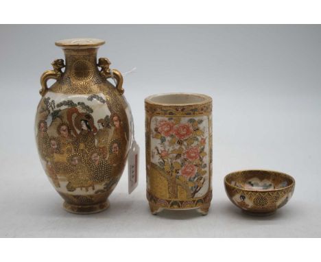 A Japanese Meiji period (1868-1912) Satsuma vase of baluster form having twin handles, typically decorated with various figur