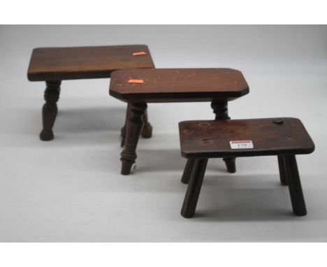 A small 19th century mahogany stool on four ring turned supports, width 23cm, together with tow other similar examplesNo visi