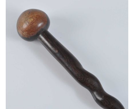 A carved ironwood knobkerrie, having a typical bulbous head on a helix shaped shaft, Zulu People, Natal Province, South Afric