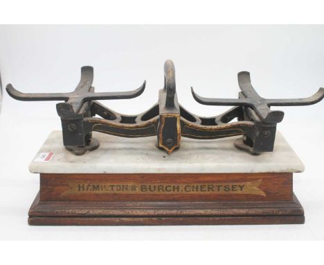 A set of Victorian marble topped iron grocer's scales