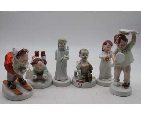 A matched set of six Royal Dux child figures, to include sledger and skier, the largest h.19cm 