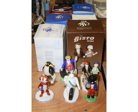 A collection of five Royal Doulton figures to include John Bull Tyre Man, Penguin, Tony the Tiger, Bibendum, and The Bisto Ki