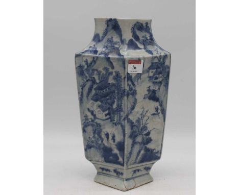 A Chinese export vase of slab sided form, under glaze blue decorated with figures within a landscape having four character ma