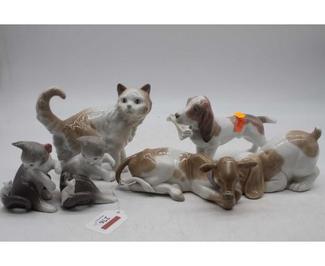 A collection of six various Lladro figures of animals to include puppy, kittens, cat, etc