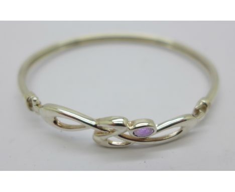 A silver Pia bangle