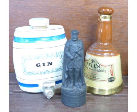 Two Wade decanters, whisky and gin and a Beneagles Scotch Whisky decanter, all lacking contents