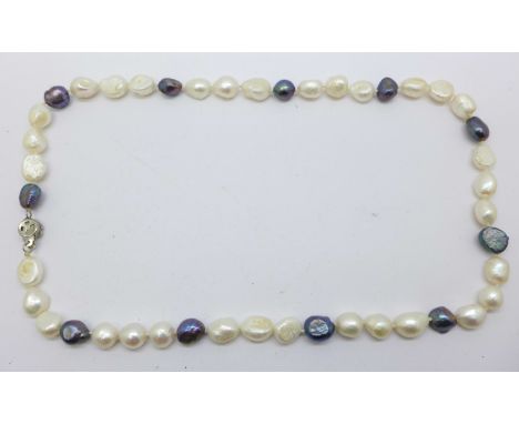 A black and white blister pearl necklace