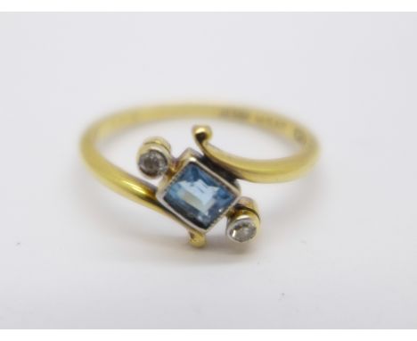 An 18ct gold, topaz and diamond ring, 2g, K