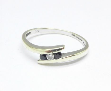 A 9ct white gold, sapphire and diamond ring, 1.9g, P