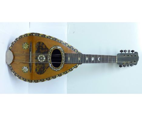 A Mandolin inlaid with abalone and mother of pearl