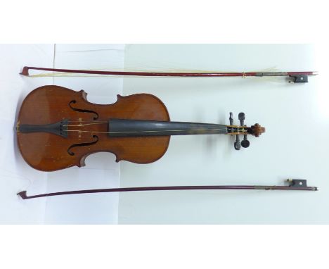 A cased violin and two bows, Antonio Stradivarius label, 36cm