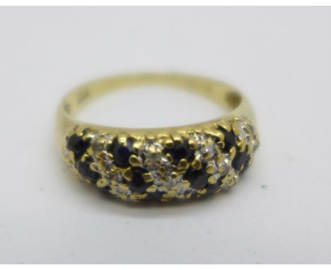 A 9ct gold, diamond and sapphire ring, 2.1g, K