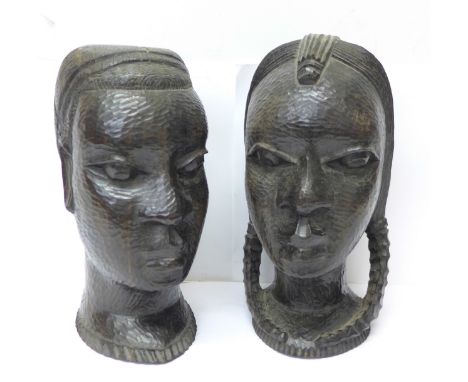Two African tribal art carved heads, 24cm