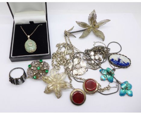 A collection of silver jewellery including a pair of enamel earrings, a brooch marked sterling silver WBS maker, jade set pen