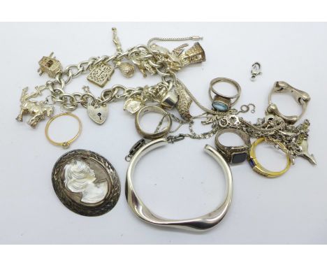 Silver jewellery including a charm bracelet, a hallmarked bangle and a kangaroo necklet, etc., 176g