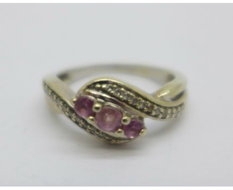 A 9ct gold, pink stone and diamond ring, 2.8g, K