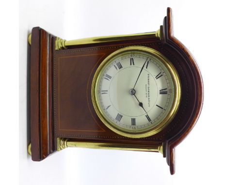An inlaid break arch cased mantel clock, Stewart Dawson &amp; Co. Ltd., Regent St. W., with key