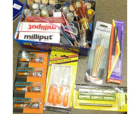 A collection of modeller's tools, Airfix paints, etc.