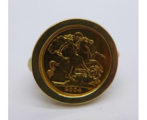 A 9ct gold set 2004 half sovereign ring, total weight 9.2g, L