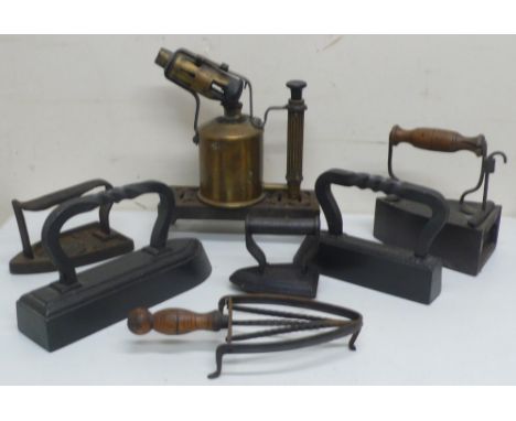 Sievert brass lamp and five various flat and smoothing irons 