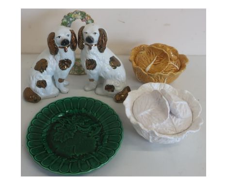 Selection of various cabbage leaf tureens and plates, a pair of Staffordshire style dogs, and a continental ceramic picture