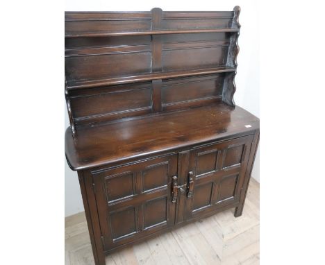 Ercol dresser, twin shelf, low back, above two four panelled doors (122cm x 152cm x 46cm) 