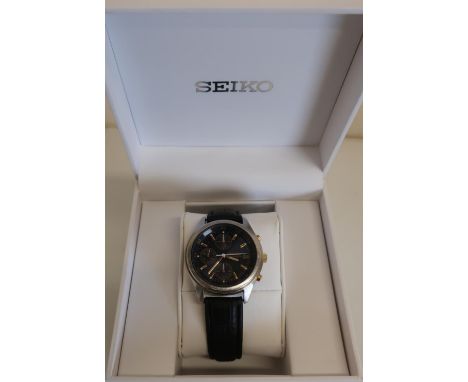 Seiko Chronograph 500 quartz wrist watch, blue dial with with three subsidiaries and date, stainless steel case with leather 