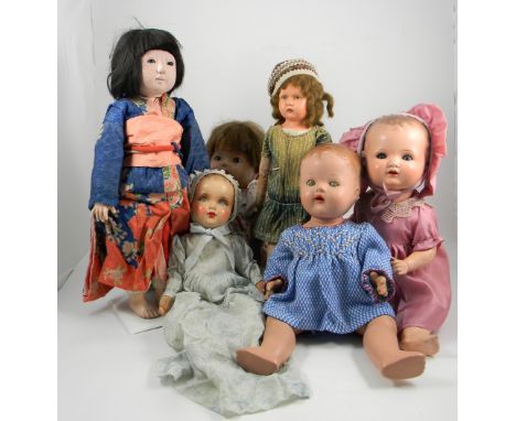 A group of composition/pot dolls, 1930’s-40’s, including an A.M 590, large Pedigree pot head doll, Deans Rag Book baby, Engli