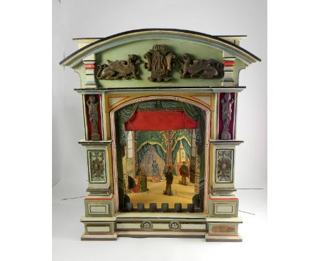 A good Child’s Toy Theatre, mid 19th century, the wooden theatre with brightly painted proscenium with applied gold painted p