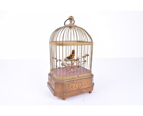 A single singing bird-in-cage automaton, by Karl Griesbaum,German, based on Bontems model, with black and yellow plumage, mov