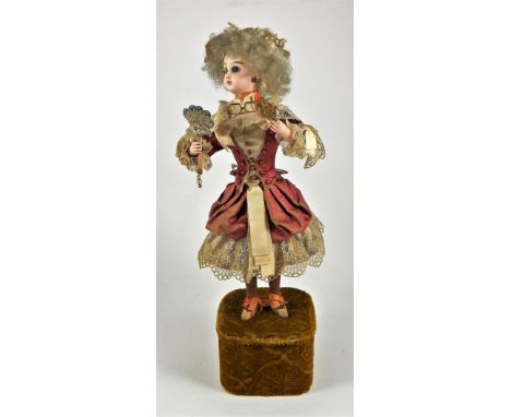 A good Leopold Lambert automata of girl with fan and lorgnette with bisque Tete Jumeau head, French circa 1890, the beautiful