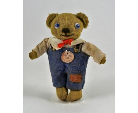 A scares Chiltern Master Teddy, circa 1920, mohair head, hands and feet with felt pads, large googly eyes, stitched nose and 