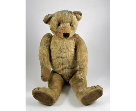 Theo A large early German light golden mohair Teddy Bears, circa 1912, with black boot button eyes, clipped muzzle, stitched 