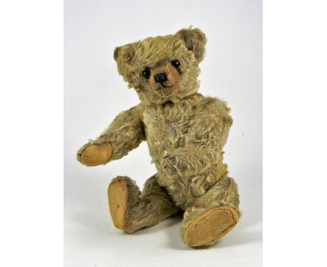 Clarence a Farnell golden mohair Teddy Bear, 1920s, straw stuffed with black boot button eyes, clipped mohair muzzle, black s