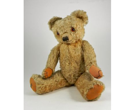 Chummy a fine and Merrythought golden mohair Teddy Bear, circa 1930, kapok and wood wool stuffed with large glass eyes, clipp