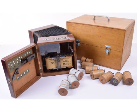 A very good Tanzbar automatic accordion,German, circa 1905, 16-note format, with flywheel train motor, nickel-plated movement