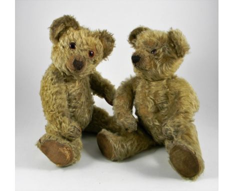 Two Chad Valley Teddy Bears with buttons, 1920s, Alex with long golden mohair, glass eyes, shaved muzzle with stitched nose a