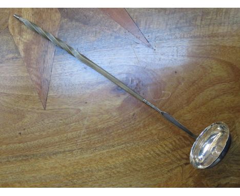 HALLMARKED SILVER COIN MOUNTED LADLE WITH TWIST HANDLE.