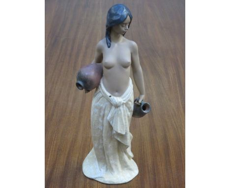 LLADRO GLAZED AND UNGLAZED CERAMIC FIGURE OF A SEMI-NUDE WATER CARRIER, APPROXIMATELY 37cm HIGH                              